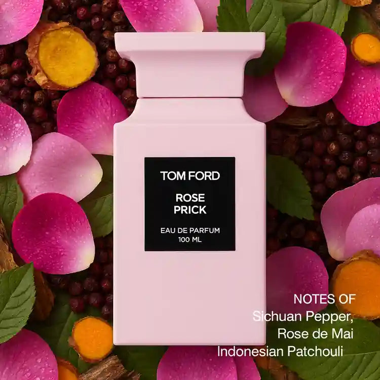 Tom Ford Rose Prick perfume bottle surrounded by flowers and spices