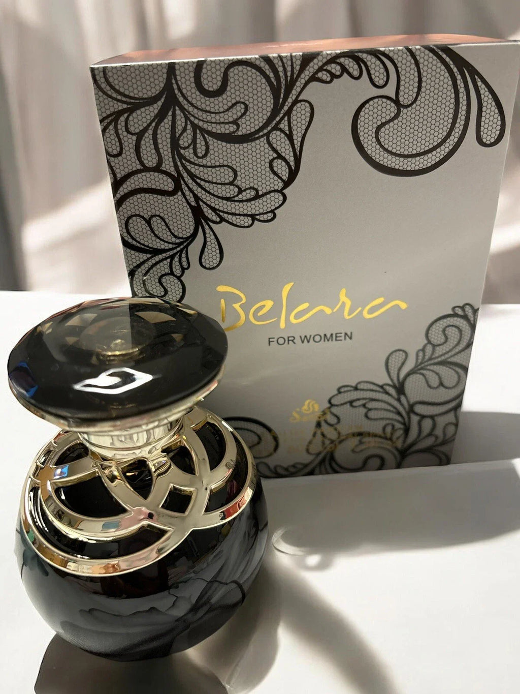 Belara Perfume Black fragrance packaging and spray bottle