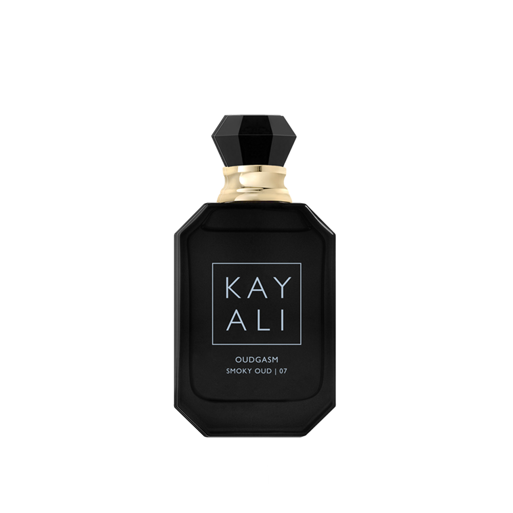 Black perfume bottle with gold cap on a white background