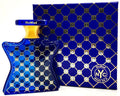 Blue and gold perfume bottle with matching box featuring 'NoMad NYC' branding.