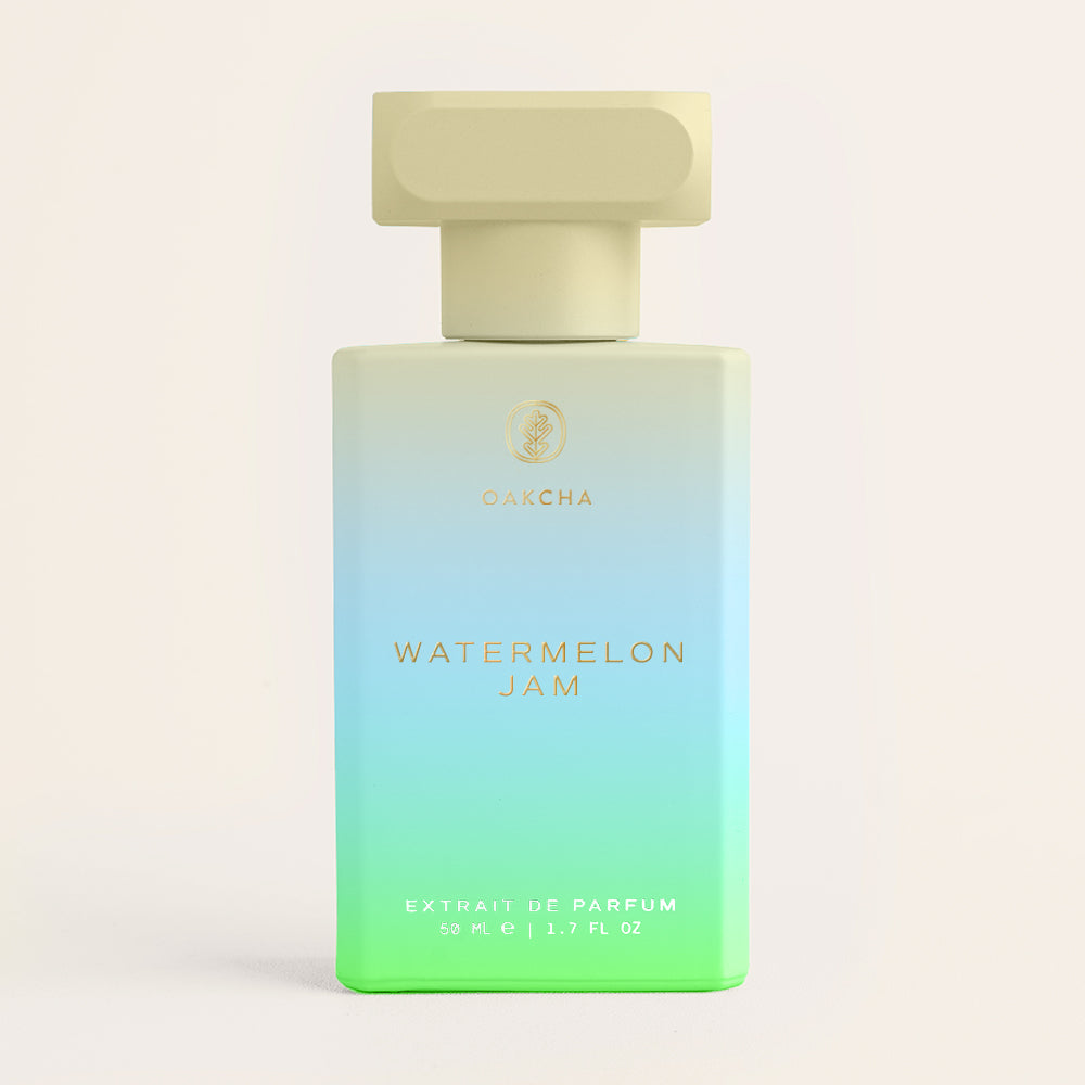 Perfume bottle with gradient design on a light beige background