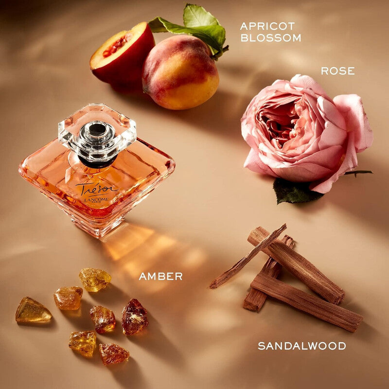 Perfume bottle with peach, rose, amber, and sandalwood elements on a beige background