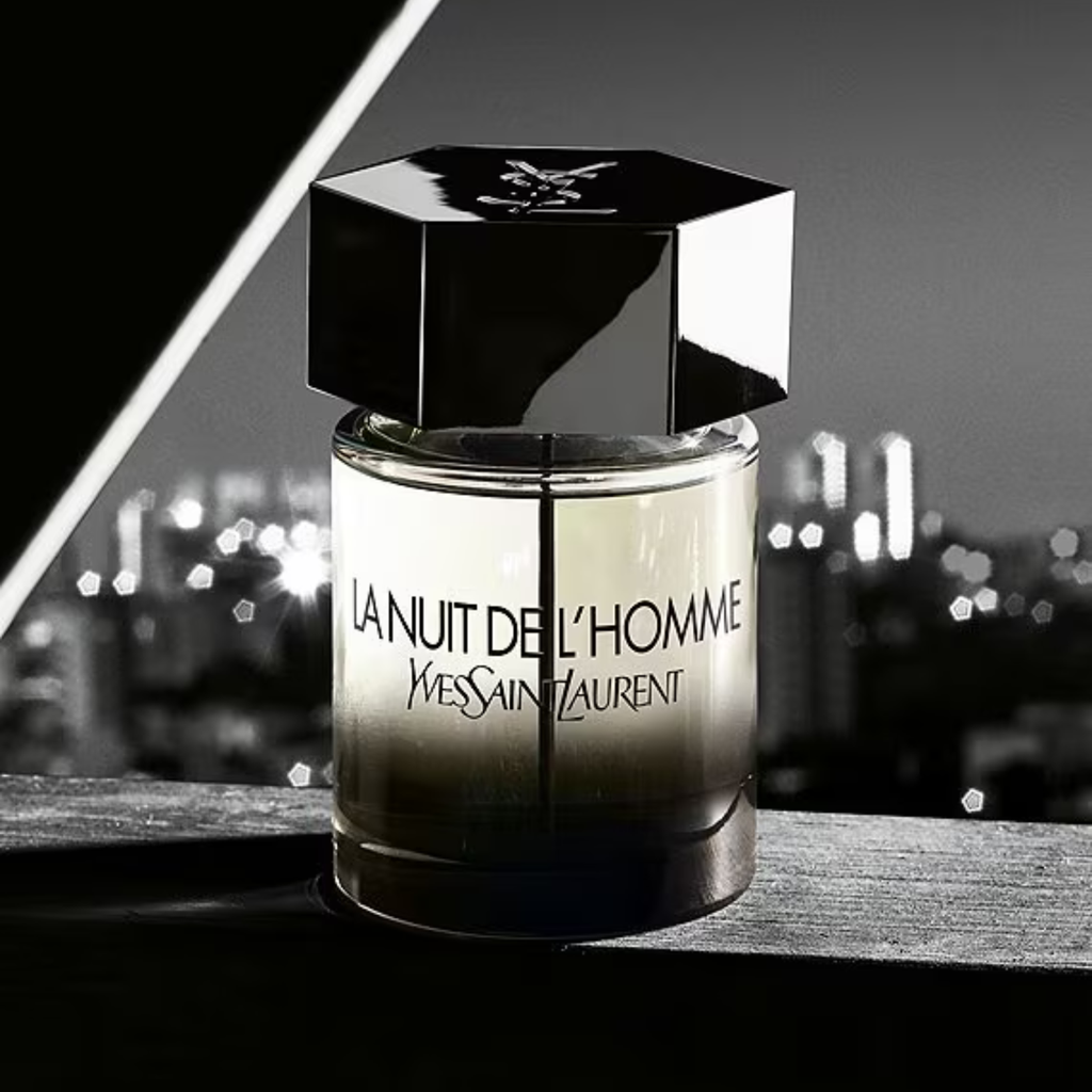Yves Saint Laurent perfume bottle with cityscape in the background